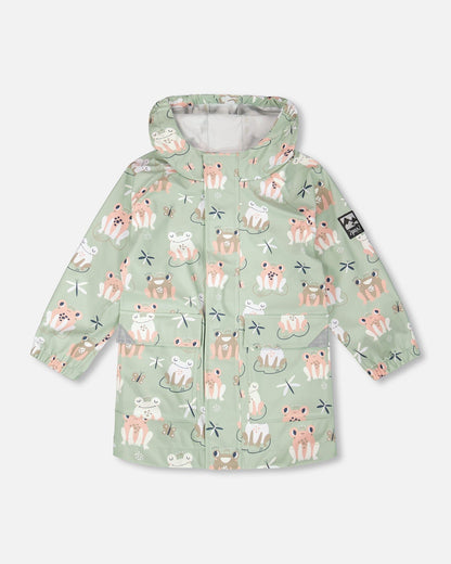 Green raincoat with color-changing frogs