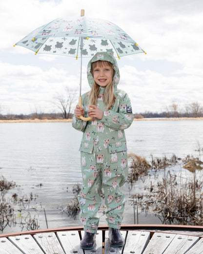 Green rain jumpsuit with color-changing frogs print