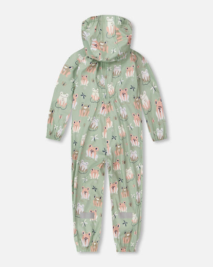 Green rain jumpsuit with color-changing frogs print